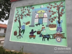 洛川乡村的壁画，展现了当地农民说或苹果的场景 - 农业厅