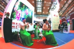 演交会现场，四川展区的演员们在演奏民乐。本报记者 卢 旭 摄 - 文化厅