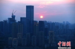资料图为重庆高楼。中新社记者 陈超 摄 - 西安网
