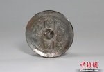 图为铜镜。陕西省考古研究院 供图 - 陕西新闻