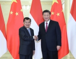 4月25日，国家主席习近平在北京人民大会堂会见印度尼西亚副总统卡拉。 - 西安网