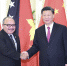 4月25日，国家主席习近平在北京人民大会堂会见巴布亚新几内亚总理奥尼尔。 - 西安网