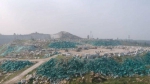应付环保检查、蒙蔽卫星监测 山东一矿山被涂上绿漆 - 西安网