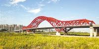 全国首座全焊接工艺钢桁架拱桥建成 - 人民政府