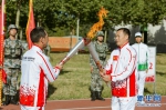 （体育）（2）第七届世界军人运动会火炬传递活动第二站在“开国大典红一师”举行 - 西安网