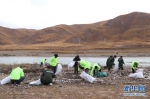 为了心中那片绿——长江源头的捡垃圾志愿队 - 西安网
