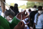 津巴布韦开始接种中国疫苗 副总统奇温加率先接种 - 西安网