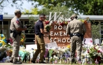 美国密歇根校园枪击幸存者：“我们这代人从没安全地上过学” - 西安网